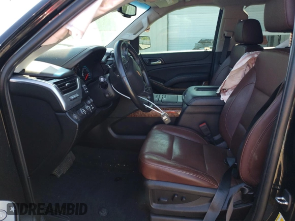 2019 Chevrolet Suburban Premier with VIN 1GNSKJKJ1KR151983, listed as a Copart auction lot 68709074 with 86,611 mi miles and Salvage Title. Bid and sale history available at DreamBid. Image 7.