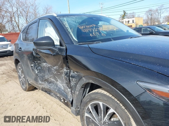 2023 Mazda CX-5 S Premium with VIN JM3KFBDM7P0201038, listed as a IAAI auction lot 41772989 with 26,227 mi miles and . Bid and sale history available at DreamBid. Image 6.