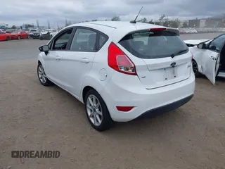 2019 Ford Fiesta SE with VIN 3FADP4EJXKM143274, listed as a IAAI auction lot 42124127 with 85,525 mi miles. Bid and sale history available at carsss.com. Image 3.
