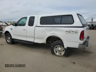 1998 Ford F-150 with VIN 1FTZX18W5WKB91459, listed as a Copart auction lot 52369095 with 185,660 mi miles and Salvage title. Bid and sale history available at DreamBid. Image 2.