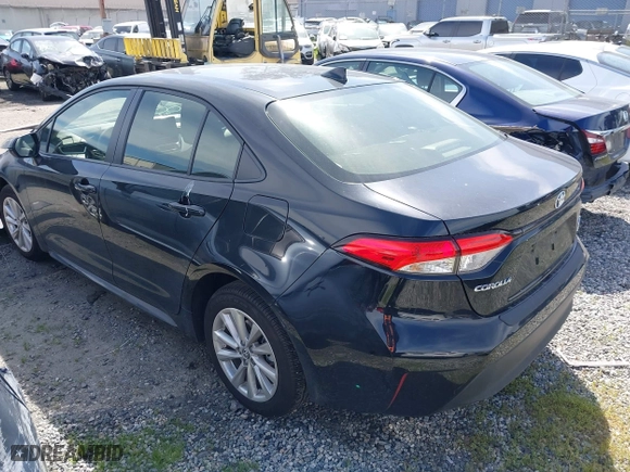 2024 Toyota Corolla Hybrid LE with VIN JTDBCMFE7R3054126, listed as a IAAI auction lot 41784668 with 15,864 mi miles. Bid and sale history available at carsss.com. Image 3.