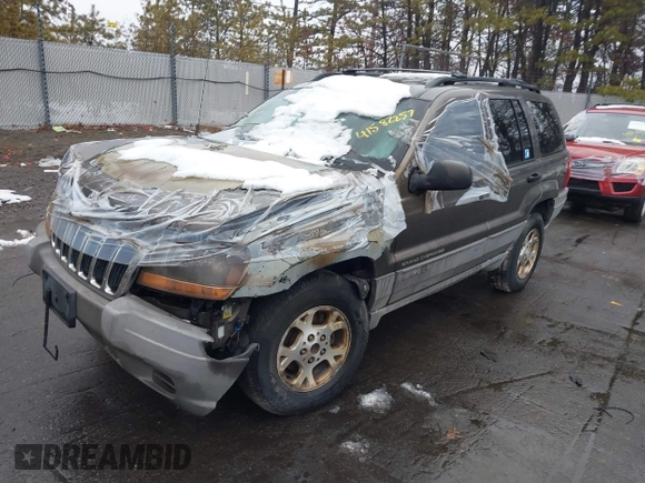 2000 Jeep Grand Cherokee Laredo with VIN 1J4GW48S1YC170303, listed as a IAAI auction lot 41582257 with 191,062 mi miles and . Bid and sale history available at DreamBid. Image 2.
