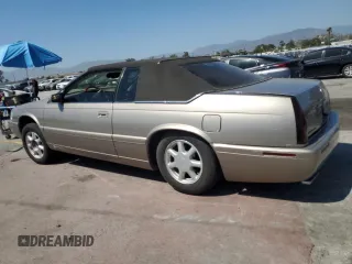 2002 Cadillac Eldorado Touring ETC z VIN 1G6ET12952B101866, wystawiony jako Copart lot #57365965 z przebiegiem Nie podano mil oraz Tytuł czysty. Historia ofert i sprzedaży dostępna na DreamBid. Obrazek 2.