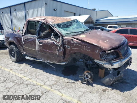 2001 Ford F-150 XLT with VIN 1FTRW08L31KE43205, listed as a Copart auction lot 56141495 with Not provided miles and Non repairable. Bid and sale history available at DreamBid. Image 4.