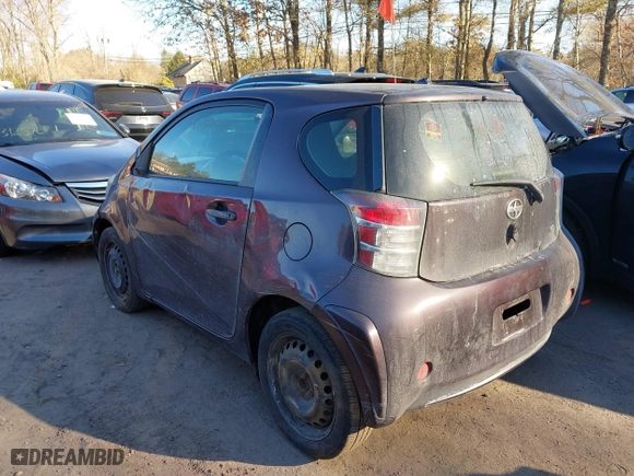 2014 Scion iQ with VIN JTNJJXB09EJ030215, listed as a IAAI auction lot 41329143 with 126,954 mi miles. Bid and sale history available at carsss.com. Image 3.