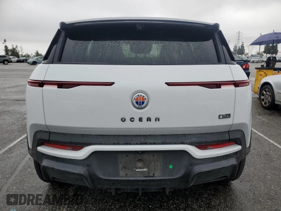 2023 Fisker Ocean One z VIN VCF1ZBU2XPG003149, wystawiony jako Copart lot #50105195 z przebiegiem Nie podano mil oraz Szkody całkowita. Historia ofert i sprzedaży dostępna na DreamBid. Obrazek 6.