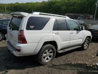 2004 Toyota 4Runner SR5 with VIN JTEBU14RX40029339, listed as a Copart auction lot 53664885 with 209,879 mi miles and Salvage Title. Bid and sale history available at DreamBid. Image 3.