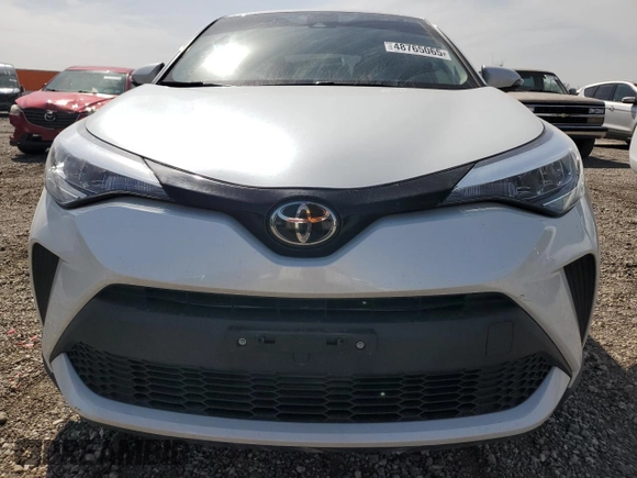 2022 Toyota C-HR XLE with VIN JTNKHMBX6N1134656, listed as a Copart auction lot 48765065 with 14,456 mi miles and Salvage Title. Bid and sale history available at carsss.com. Image 5.