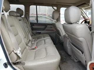 2002 Lexus LX 470 z VIN JTJHT00W423522126, wystawiony jako Copart lot #56582855 z przebiegiem 280 679 mil mil oraz Szkoda całkowita • Salvage title. Historia ofert i sprzedaży dostępna na DreamBid. Obrazek 11.