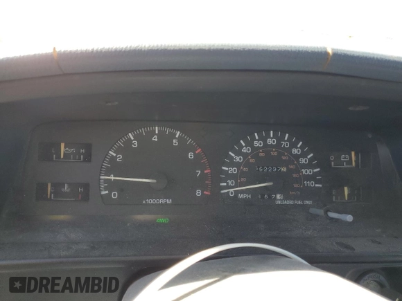 1991 Toyota Pickup z VIN JT4RN13PXM6031833, wystawiony jako Copart lot #58953095 z przebiegiem 252 237 mil mil oraz Czysty tytuł • Clean title. Historia ofert i sprzedaży dostępna na DreamBid. Obrazek 9.