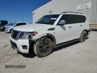 2017 Nissan Armada Platinum z VIN JN8AY2ND7H9008094, wystawiony jako Copart lot #48615385 z przebiegiem 123 501 mil mil oraz Szkoda całkowita • Salvage title. Historia ofert i sprzedaży dostępna na DreamBid. Obrazek 1.