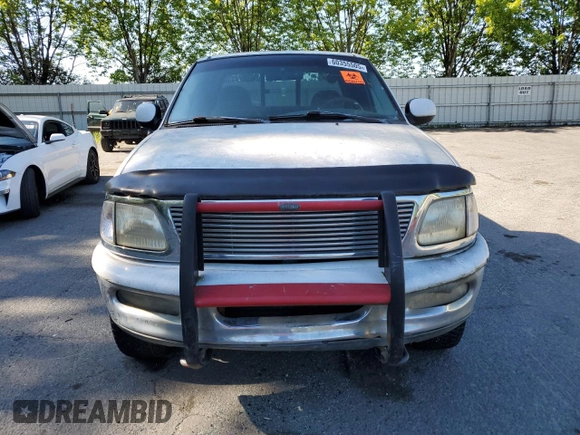 1998 Ford F-150 z VIN 1FTZX18W2WNC09396, wystawiony jako Copart lot #60355505 z przebiegiem 221 565 mil mil oraz Czysty tytuł • Clean title. Historia ofert i sprzedaży dostępna na DreamBid. Obrazek 5.