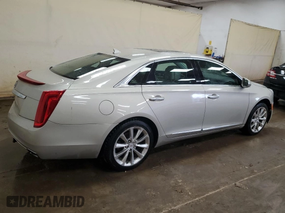 2013 Cadillac XTS Luxury with VIN 2G61R5S33D9166106, listed as a Copart auction lot 50535485 with 129,745 mi miles and Clean title. Bid and sale history available at DreamBid. Image 3.