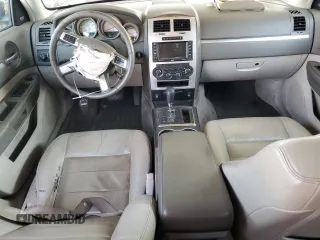 2008 Dodge Magnum z VIN 2D8GZ57208H100293, wystawiony jako Copart lot #69345394 z przebiegiem 191 085 mil mil oraz Szkoda całkowita • Salvage title. Historia ofert i sprzedaży dostępna na DreamBid. Obrazek 8.