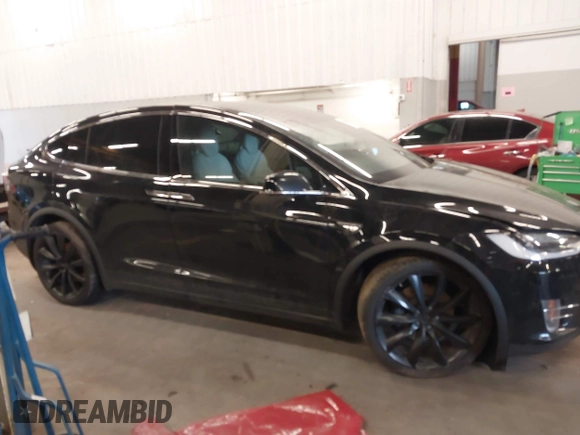 2016 Tesla Model X 70D with VIN 5YJXCBE23GF004941, listed as a IAAI auction lot 41706603 with 108,052 mi miles and . Bid and sale history available at DreamBid. Image 13.