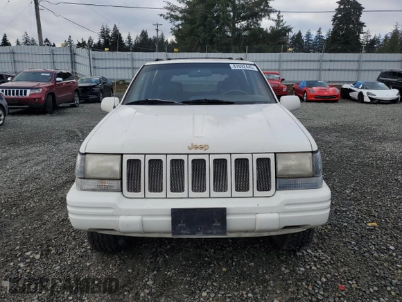1997 Jeep Grand Cherokee Limited with VIN 1J4GZ78Y7VC772292, listed as a Copart auction lot 87692445 with 0 mi miles and Salvage Title. Bid and sale history available at carsss.com. Image 5.