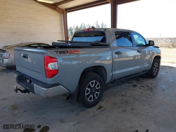 2021 Toyota Tundra 4WD SR5 with VIN 5TFDY5F14MX026220, listed as a IAAI auction lot 41425555 with 85,622 mi miles. Bid and sale history available at carsss.com. Image 4.