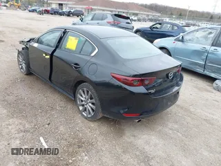 2021 Mazda 3 Preferred with VIN JM1BPBCL4M1328334, listed as a IAAI auction lot 42186709 with 119,926 mi miles and . Bid and sale history available at DreamBid. Image 3.
