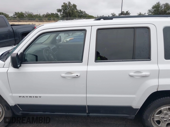 2012 Jeep Patriot Sport with VIN 1C4NJPBAXCD639209, listed as a IAAI auction lot 41539883 with 244,585 mi miles and . Bid and sale history available at DreamBid. Image 14.