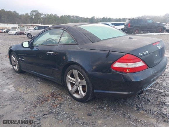 2009 Mercedes-Benz SL-Class V8 with VIN WDBSK71F29F143653, listed as a IAAI auction lot 41310556 with 115,377 mi miles. Bid and sale history available at carsss.com. Image 3.