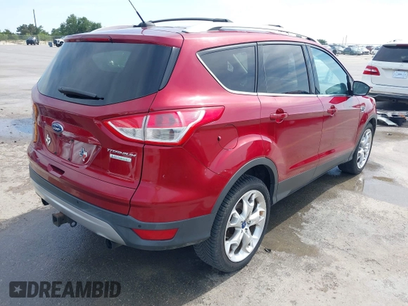 2013 Ford Escape Titanium with VIN 1FMCU0J98DUC93235, listed as a IAAI auction lot 42253289 with 107,030 mi miles and . Bid and sale history available at DreamBid. Image 4.
