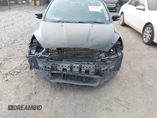 2016 Ford Focus SE z VIN 1FADP3FEXGL310270, wystawiony jako IAAI lot #40956503 z przebiegiem 156 812 mil mil oraz . Historia ofert i sprzedaży dostępna na DreamBid. Obrazek 6.