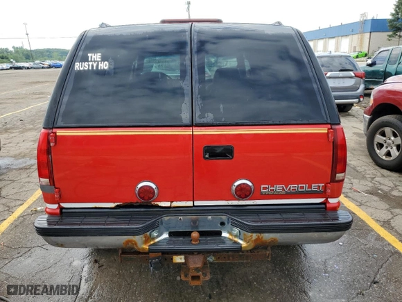 1999 Chevrolet Tahoe Z71 with VIN 1GNEK13R9XJ476615, listed as a Copart auction lot 61312114 with 174,729 mi miles and Clean Title. Bid and sale history available at carsss.com. Image 6.