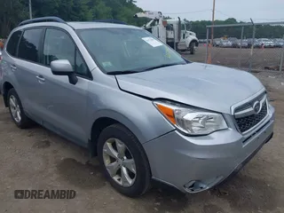 2014 Subaru Forester Premium with VIN JF2SJAGC1EH410022, listed as a IAAI auction lot 42571059 with 134,572 mi miles and . Bid and sale history available at DreamBid. Image 1.
