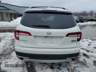 2020 Honda Pilot Touring 7-Passenger z VIN 5FNYF6H68LB001447, wystawiony jako Copart lot #46293255 z przebiegiem 273 940 mil mil oraz Szkoda całkowita • Salvage title. Historia ofert i sprzedaży dostępna na DreamBid. Obrazek 6.