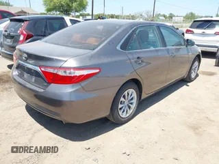 2016 Toyota Camry XLE with VIN 4T4BF1FK4GR581867, listed as a IAAI auction lot 42002126 with 74,811 mi miles. Bid and sale history available at carsss.com. Image 4.