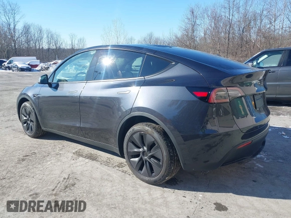 2025 Tesla Model Y Long Range with VIN 7SAYGDED0SF256230, listed as a IAAI auction lot 41356520 with 262 mi miles and . Bid and sale history available at DreamBid. Image 3.
