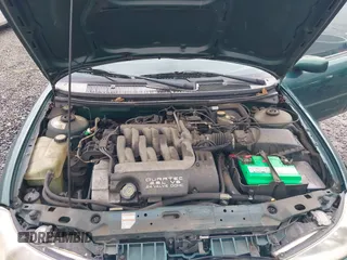 1999 Ford Contour SE Fleet with VIN 1FAFP66L3XK227522, listed as a IAAI auction lot 41702873 with 140,926 mi miles. Bid and sale history available at carsss.com. Image 10.