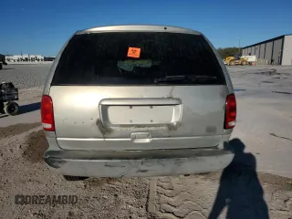 1999 Plymouth Voyager Grand SE z VIN 1P4GP44G1XB579504, wystawiony jako Copart lot #50064475 z przebiegiem Nie podano mil oraz Nie do naprawy. Historia ofert i sprzedaży dostępna na DreamBid. Obrazek 6.