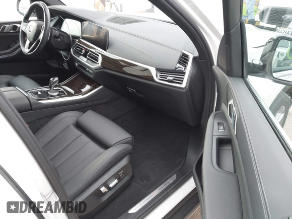 2021 BMW X5 xDrive40i with VIN 5UXCR6C03M9G36156, listed as a IAAI auction lot 42125009 with 30,877 mi miles. Bid and sale history available at carsss.com. Image 5.