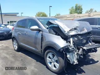 2012 Kia Sportage LX with VIN KNDPB3A2XC7273890, listed as a IAAI auction lot 39784243 with 146,067 mi miles. Bid and sale history available at carsss.com. Image 1.