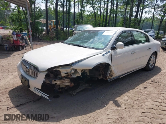 2009 Buick Lucerne CXL with VIN 1G4HD57M79U135698, listed as a IAAI auction lot 42165966 with 131,615 mi miles. Bid and sale history available at carsss.com. Image 2.
