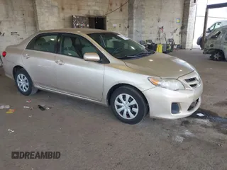 2011 Toyota Corolla L with VIN 2T1BU4EE3BC543537, listed as a IAAI auction lot 41906173 with 182,663 mi miles. Bid and sale history available at carsss.com. Image 1.