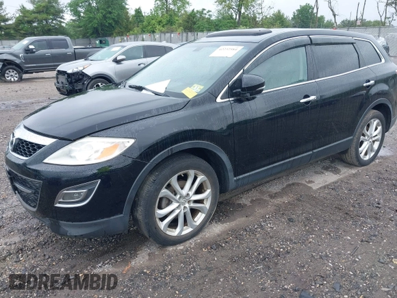 2012 Mazda CX-9 Grand Touring z VIN JM3TB3DV1C0360212, wystawiony jako IAAI lot #42232584 z przebiegiem 99 582 mil mil oraz . Historia ofert i sprzedaży dostępna na DreamBid. Obrazek 18.