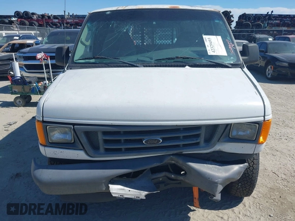 2006 Ford Econoline Cargo with VIN 1FTRE14W06HA83095, listed as a IAAI auction lot 42329493 with 189,119 mi miles and . Bid and sale history available at DreamBid. Image 12.