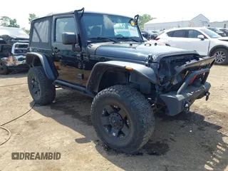 2015 Jeep Wrangler Freedom Edition with VIN 1C4AJWAG0FL520027, listed as a IAAI auction lot 42585222 with 78,980 mi miles and . Bid and sale history available at DreamBid. Image 1.