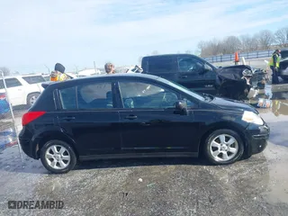 2012 Nissan Versa S with VIN 3N1BC1CP8CK271046, listed as a IAAI auction lot 41318997 with 138,111 mi miles. Bid and sale history available at carsss.com. Image 13.
