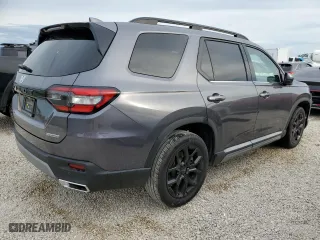 2025 Honda Pilot Touring with VIN 5FNYG2H75SB002553, listed as a Copart auction lot 76869764 with 7,426 mi miles and Salvage Title. Bid and sale history available at carsss.com. Image 3.