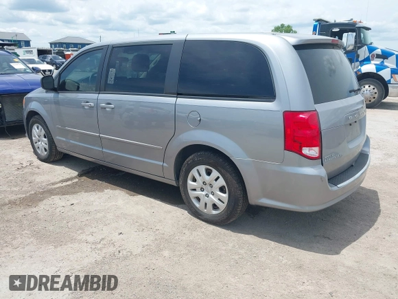 2015 Dodge Grand Caravan American Value with VIN 2C4RDGBGXFR542672, listed as a IAAI auction lot 42230608 with 102,753 mi miles and . Bid and sale history available at DreamBid. Image 3.