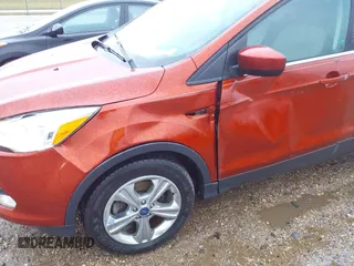 2016 Ford Escape SE with VIN 1FMCU0GXXGUA64940, listed as a IAAI auction lot 41223394 with 150,929 mi miles and . Bid and sale history available at carsss.com. Image 6.