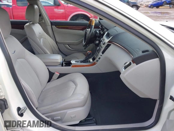 2012 Cadillac CTS Luxury with VIN 1G6DG5E57C0137409, listed as a IAAI auction lot 42633890 with 86,886 mi miles and . Bid and sale history available at DreamBid. Image 5.