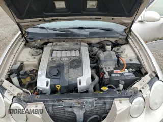 2005 Kia Amanti z VIN KNALD124155052901, wystawiony jako Copart lot #43609785 z przebiegiem 143 368 mil mil oraz Szkoda całkowita • Salvage title. Historia ofert i sprzedaży dostępna na DreamBid. Obrazek 11.