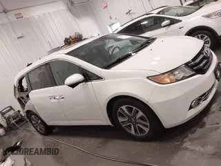 2015 Honda Odyssey Touring Elite with VIN 5FNRL5H92FB020159, listed as a IAAI auction lot 42103240 with 79,322 mi miles and . Bid and sale history available at DreamBid. Image 14.