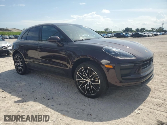 2024 Porsche Macan with VIN WP1AA2A53RLB14849, listed as a Copart auction lot 57979155 with 10,031 mi miles and Salvage title. Bid and sale history available at DreamBid. Image 4.