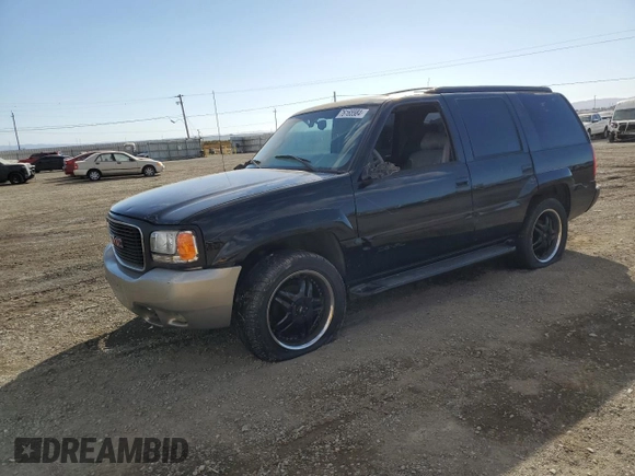2000 GMC Denali z VIN 1GKEK13R8YR109690, wystawiony jako Copart lot #76165584 z przebiegiem 153 366 mil mil oraz Szkoda całkowita • Salvage title. Historia ofert i sprzedaży dostępna na DreamBid. Obrazek 1.