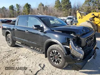 2024 Nissan Titan Pro-4X with VIN 1N6AA1ED6RN111104, listed as a Copart auction lot 46129425 with 4,903 mi miles and Salvage title. Bid and sale history available at DreamBid. Image 4.